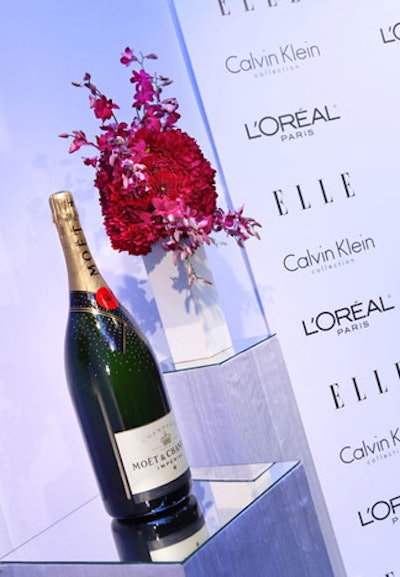 A decorative bottle of Moët stood at the end of the arrivals carpet for celebrities to sign.