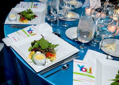 For the evening's first course, Food for Thought prepared chilled corn bisque, an haricot vert salad, and a mesclun salad topped with red peppers and blue cheese.