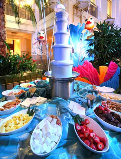 Dubbed the 'blue lagoon fountain,' the dessert station doled out blue chocolate fondue accompanied by pound cake, brownies, pretzels, and fruit.