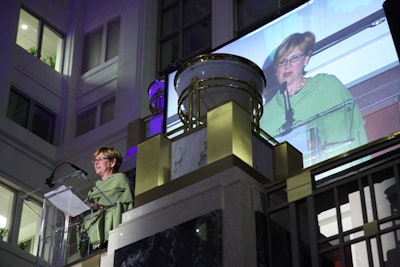 Live images of the speakers were projected on screens in the atrium.