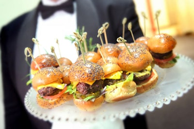 Among the passed hors d'oeuvres were cheeseburger sliders on poppy seed buns.