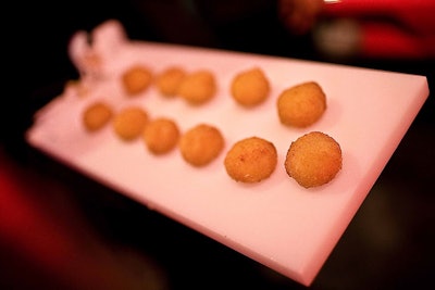 Snacks such as egg rolls, mini burgers, and croquettes were passed throughout the evening.