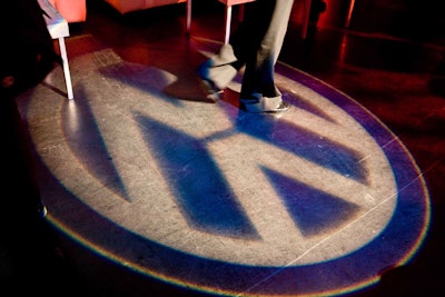 Gobos of the Volkswagen logo moved across the venue floor.