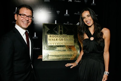 Demi Moore presented the award to Pierre Rainero, Cartier International's image, style, and heritage director.