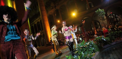 Seventies-era fairies and sprites from Boston's American Repertory Theatre pumped up the energy as guests arrived for the dinner portion of the evening, which was devoted to fun and food instead of speeches.