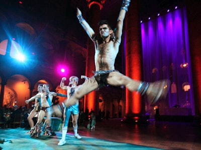 Dancers performed an excerpt of The Donkey Show on the stage in the middle of the dining room prior to the main course, and also moved through the dining room, interacting with guests.
