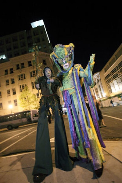 Costumed stilt walkers guided attendees as they walked from Sidney Harman Hall to the National Building Museum for dinner.