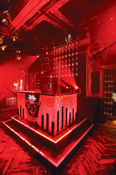 Cover art from the Black Eyed Peas ' latest release, The E.N.D., inspired the glowing booth made by Caravents for the album's launch party in New York in June.