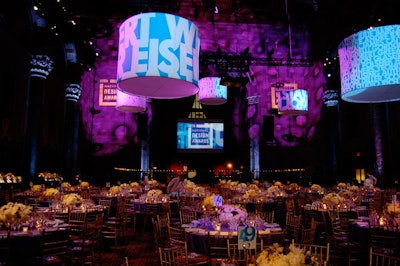 To complement the venue's grand architecture and add some design elements, David Stark created enormous lampshades that were suspended over the dinner tables.