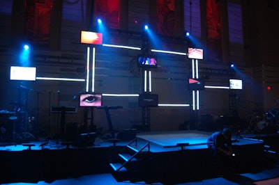 Multiple screens provided a backdrop for the stage on the Trading Floor, the main venue for the party.