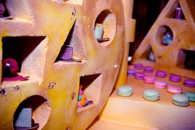 A dessert sculpture created by Nadège Patisserie featured mini cakes and macaroons.