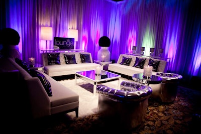 White sofas, mirror-topped tables, and sequined pillows from Lounge Rentals added sparkle to the dancers ' lounge.