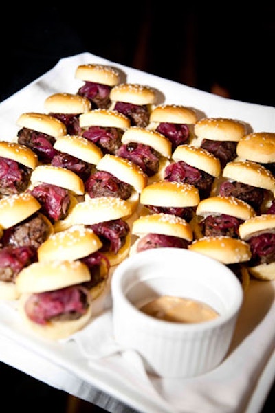 Hors d 'oeuvres included mini burgers, spring rolls, and tuna tartare in phyllo cups.