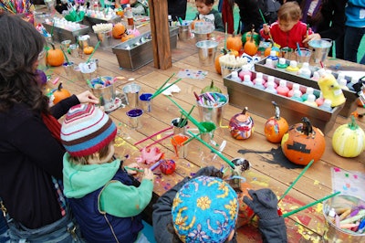 After children picked out their pumpkins, they were invited to the crafts table to decorate their acquisitions with paint.