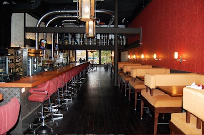 ChurchKey has 10 upholstered booths for four and 33 swivel chairs at the bar.