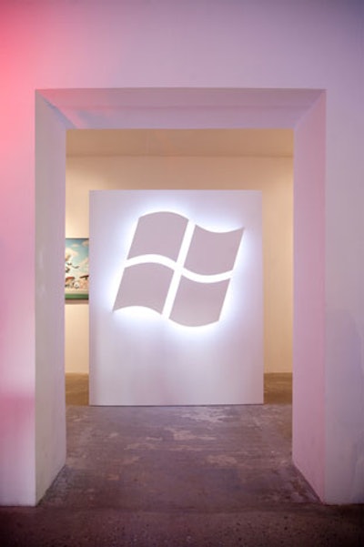 A backlit Windows logo marked the entrance to the event and played up the production team's simple approach to the decor.