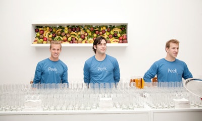 Echoing the low-key look of the event, catering staff and bartenders sported minimally branded shirts.