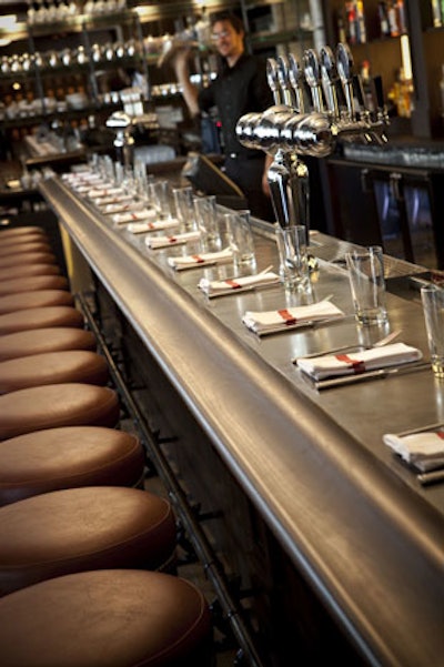The main dining room's zinc-topped bar seats 19 and has extra-wide vinyl-topped stools.