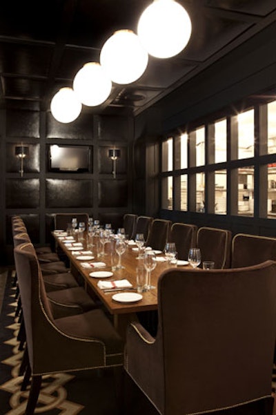 Againn's 14-seat private dining room has leather-paneled walls and a glass-enclosed view of the kitchen.
