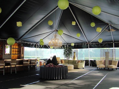 Tents N Events ' black vinyl tents can be customized to combine black and clear top and side panels.