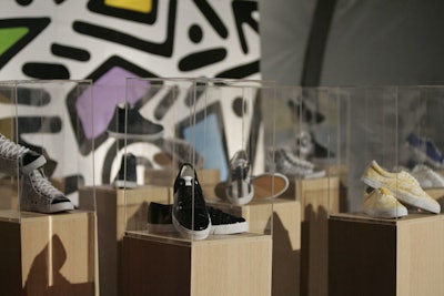 Gen Art presented accessories designers ' creations in small installations during a cocktail reception prior to the runway show.