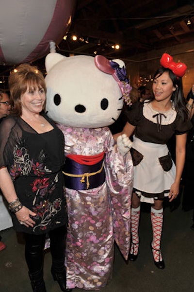 Royal/T owner Sue Hancock posed with a Hello Kitty puppet and one of the venue's costumed servers.