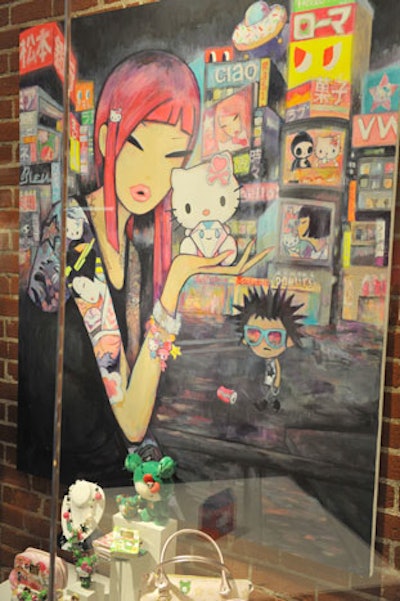 Art lines brick walls and fills glass cases as part of the exhibit.