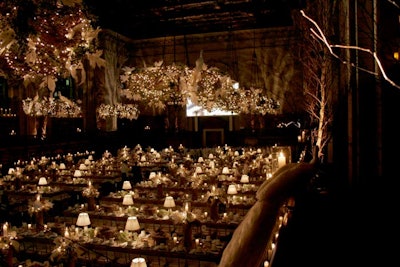 To give a sense of scale to the decor, Monn positioned fake birds in the wreathes and on the banisters lining the dining area.