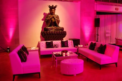 Black sequined pillows topped white sofas from Lounge Rentals.