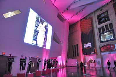 Organizers projected oversize magazine covers onto a wall in the museum's Hyacinth Gloria Chen Crystal Court.