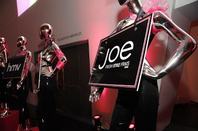 Signs created by Icon Digital Printing displayed the names of sponsors and hung from mannequins throughout the space.