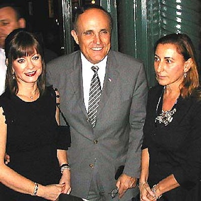Judith Nathan (left) and Mayor Rudolph Giuliani were among the guests who showed up to toast Miuccia Prada's new store. (Photo by Jeff Thomas)
