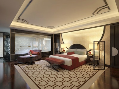The master bedroom of the 22nd-floor Mandarin Suite has Asian-inspired decor and a muted color palette.