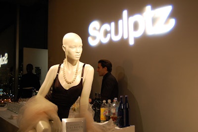Even the bar area was marked with design elements, including a logo gobo and a dressed mannequin.