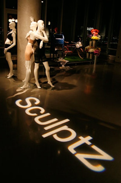 Sculptz also incorporated mannequins into the event's design, placing them around the space's concrete columns.