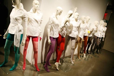 Beside the entrance to the event, a line of mannequins displayed the new collection of colorful tights from Sculptz.