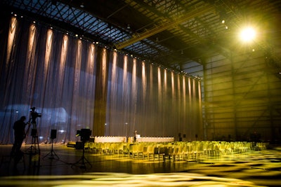 At 60 feet tall and 200 feet wide, producers said, the Kabuki drape used at Continental's unveiling may have been the world's largest.