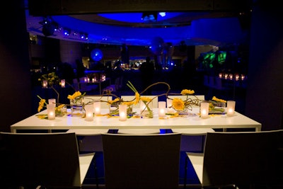 Seating areas featured vase-less floral arrangements woven around candles.