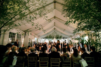 Metal canopy fixtures in the courtyard allow the area to be tented for events.