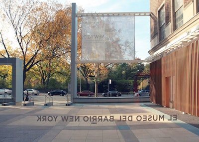 Newly added to the Fifth Avenue museum is a structural light pylon that marks the entrance to the front courtyard and holds graphic banners.