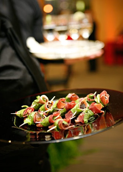 The menu from Cerise Fine Catering included hors d 'oeuvres like prosciutto-wrapped figs with goat cheese.