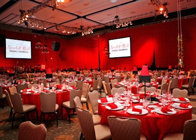Red draping surrounded the dining room, set up to feel like a high-end restaurant.