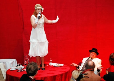 The evening included an impromptu performance by a mobster and his date during the dinner.