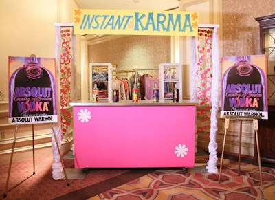 With bottles and signs decorated Andy Warhol-style, Absolut Vodka provided the liquor for the Knock Out Abuse reception. Guests could peruse the 'Instant Karma ' booth to purchase jewelry and scarves.