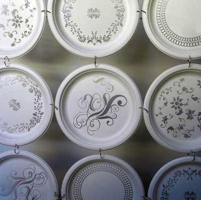 At New York Taste, the intricacy of the laser cutouts on a wall of paper plates was mesmerizing