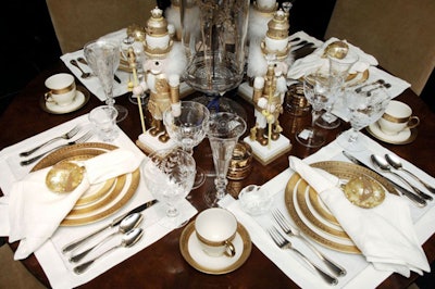 The Society of Memorial Sloan-Kettering Cancer Center member Muffie Potter Aston designed this Bloomingdale's holiday tabletop for the publication of the Park Avenue Potluck Celebrations cookbook.