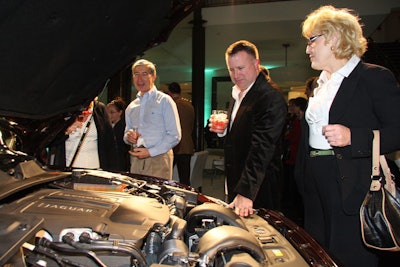 In one room, guests could look under the hood of the display vehicle.