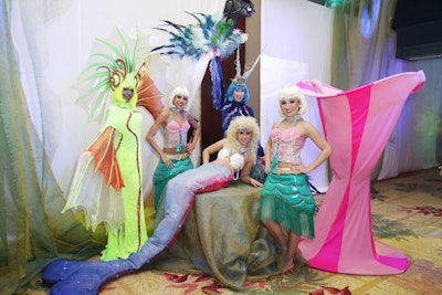 Mermaid entertainers sat in the hallway leading from the cocktail area into the ballroom, named for the Beatles song 'Octopus's Garden, ' for dinner.