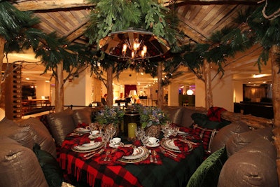 RL Home's Christmas-like setting filled a gazebo with plaid blankets, plush pillows, and garlands flecked with fairy lights.