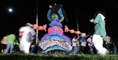 Percussionists danced around a large voodoo doll as part of Haitian artist Edouard Duval Carrié's Ra Ra Parade down Ocean Drive from midnight until 3 a.m.